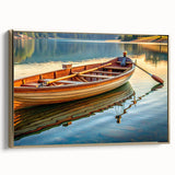 Framed canvas of a vintage rowboat on calm water, in muted black and gold tones, suitable for living room decor.