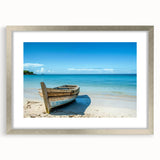 Abstract art print of a rowboat in muted blue and gray tones on a framed silver mat, ideal for dining room decor.