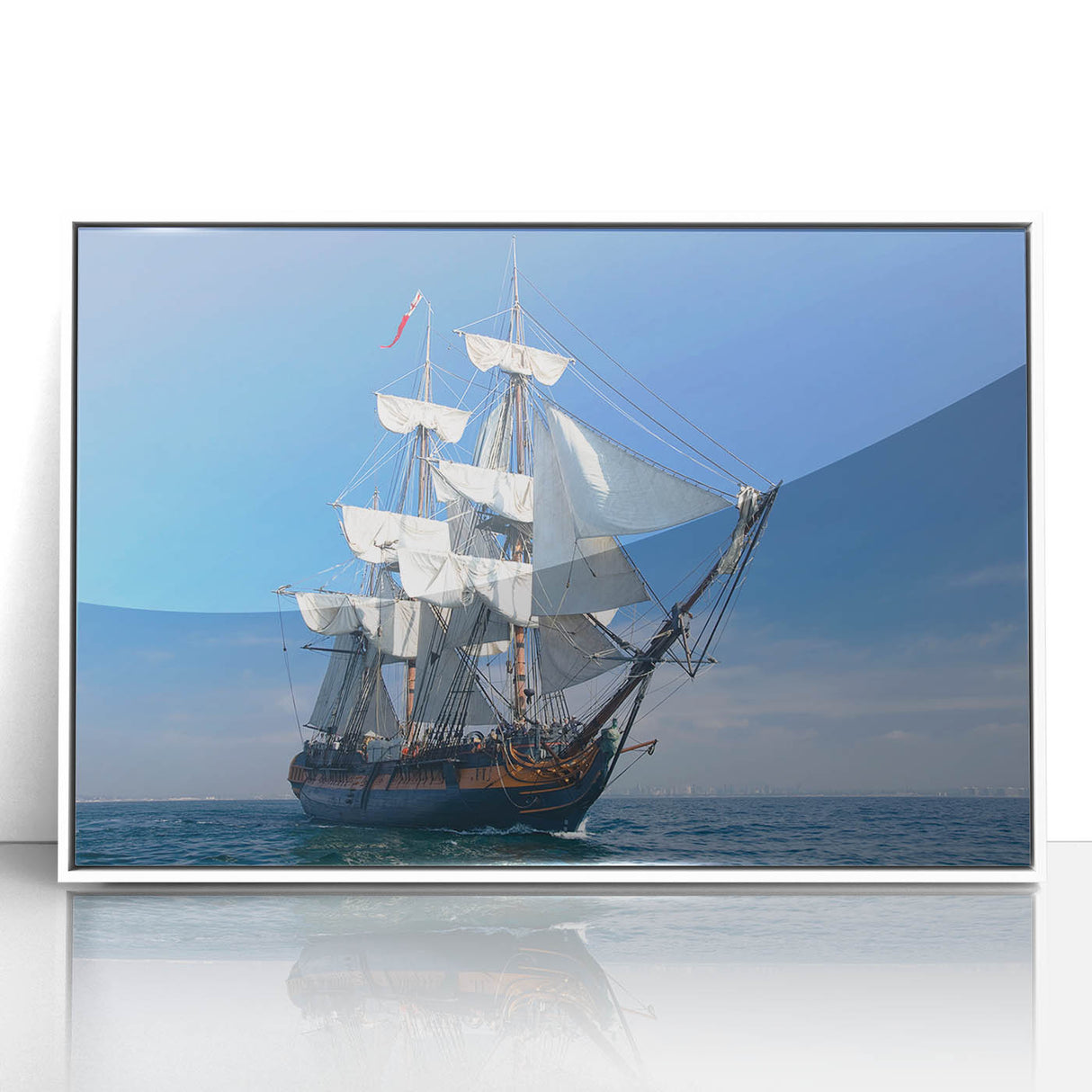 Mid-century modernist style large art print of a ship, in muted blue and gray tones, acrylic framed.