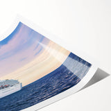 Extra large wall art featuring a ship at sea in muted gray and blue tones on a rolled canvas.