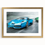 Extra large abstract art print depicting race cars in vibrant colors on a textured canvas, framed in gold.