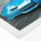 Art deco poster featuring a dynamic race car scene in bold red and black tones on rolled canvas.