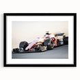 Extra large abstract art print featuring vibrant, colorful race cars on textured canvas, ideal for living room decor.