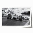 Rolled print of race cars in action, featuring bright color accents, ideal for art wall dining room.