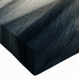 Black and white photo of race cars in motion on a track, printed on large stretched canvas, suited for bedroom wall decor.