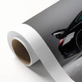 Art Deco style poster of vintage sports cars in muted colors on rolled canvas.