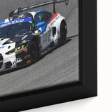 Extra large framed canvas featuring a close-up of a vintage car in black with colorful, textured details.
