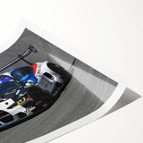 Extra large wall art featuring a collection of vintage cars in muted colors on a rolled print.