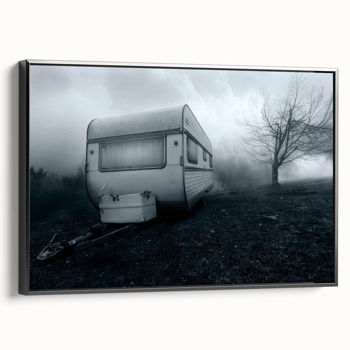 Black and white framed canvas featuring a vintage caravan in a landscape setting, ideal for bedroom decor.