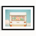 Extra large abstract art print of a colorful caravan scene on textured canvas, framed in black, ideal for living room decor.
