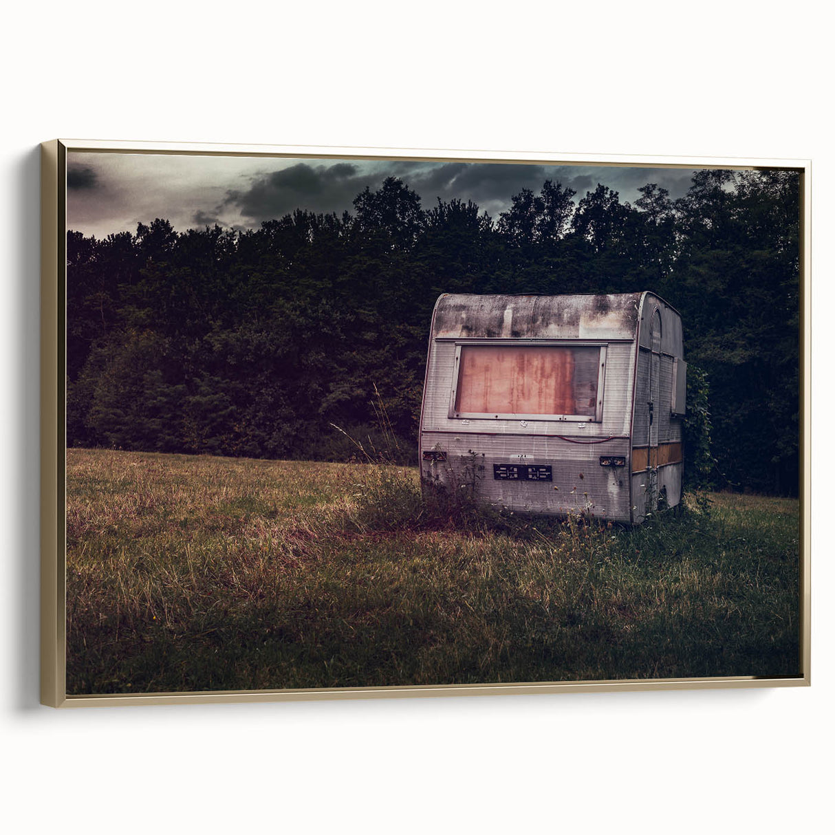 Framed canvas featuring a vintage caravan in a colorful landscape, ideal for adding a retro touch to any living space.