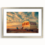 Abstract art print featuring a silver-framed caravan design in muted earth tones, suitable for bedroom or dining room decor.