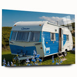 Side view of a caravan depicted in large abstract style on acrylic glass, using a palette of cool grays and blues.