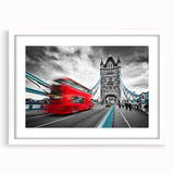 Abstract art print of assorted transportation vehicles in a mix of vibrant colors on a white framed poster.