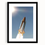 Colorful abstract art print of a spacecraft, in vibrant blue and orange tones, framed in black.