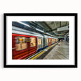 Abstract art print featuring a colorful, textured subway scene on a large black-framed canvas, ideal for living room decor.
