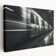 Subway train in motion depicted in a grayscale stretched canvas, suitable for kitchen wall art.