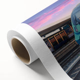 Art deco style train illustration in muted blues and greens on rolled canvas, ideal for nursery wall art.