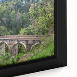 Extra large framed canvas of a black steam train with vibrant, textured color details, ideal for living room decor.