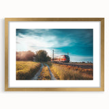 Extra large abstract art print of a train in textured gray and gold tones, framed in gold, ideal for living room decor.