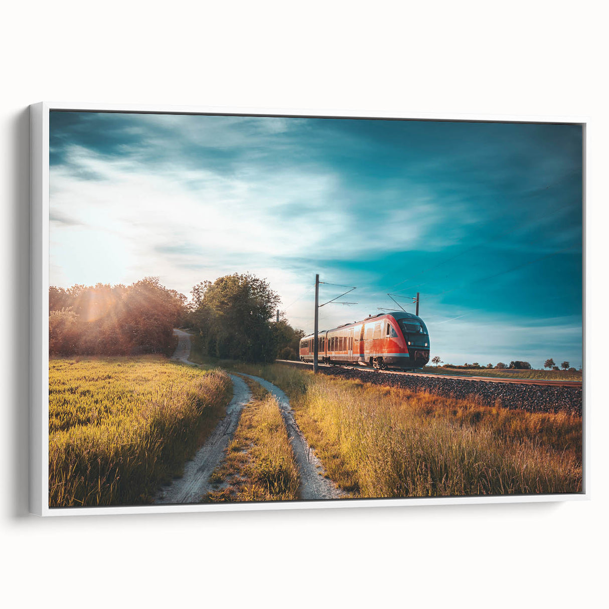 Vintage poster art of a train in colorful hues on a black background, printed on a large framed canvas.