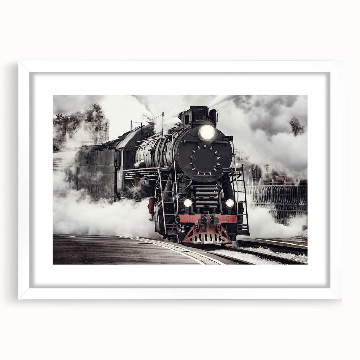 Abstract art print of a stylized train in muted grays and blues, framed with a white mat.