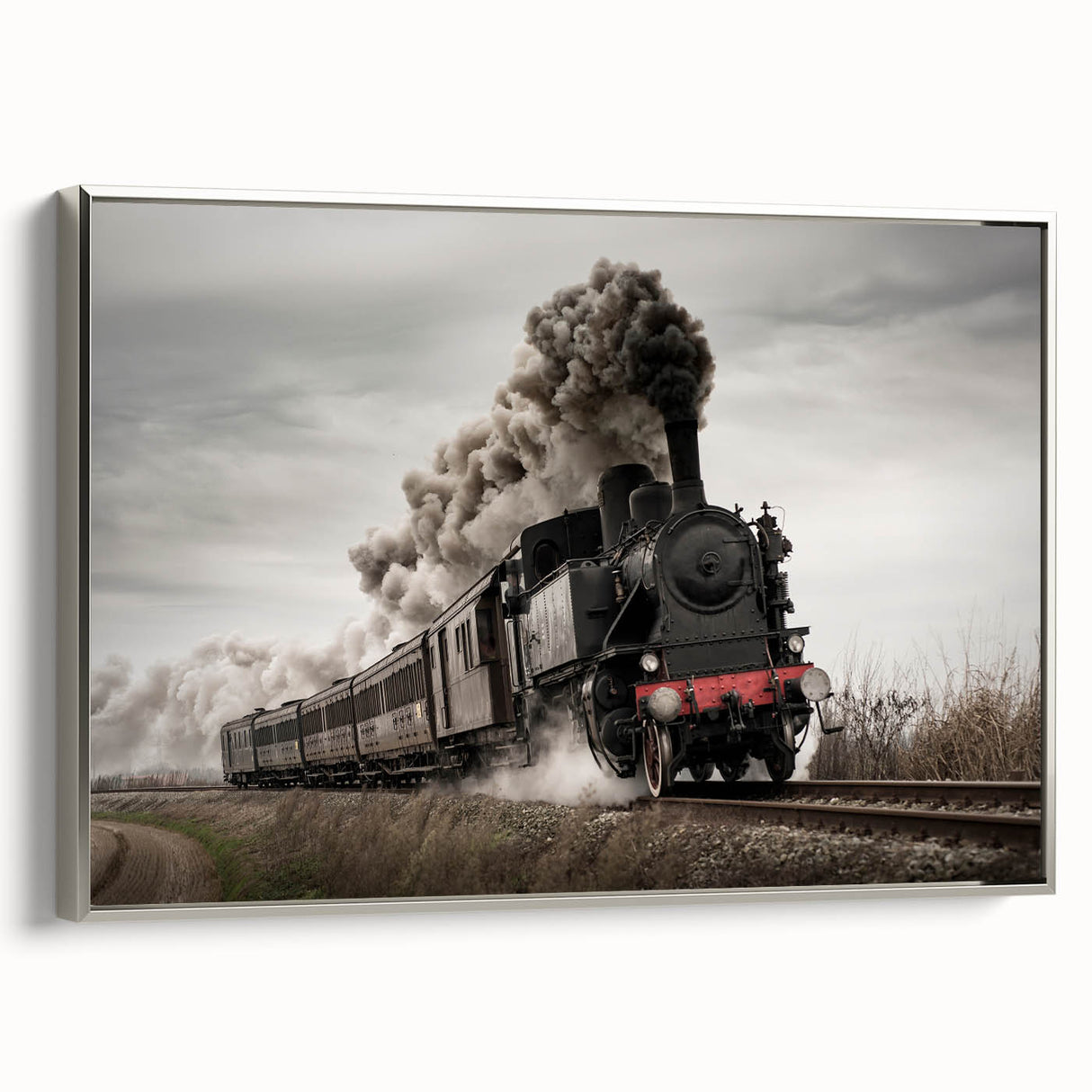 Framed canvas featuring a vintage train landscape in black with colorful accents, ideal for office decor.