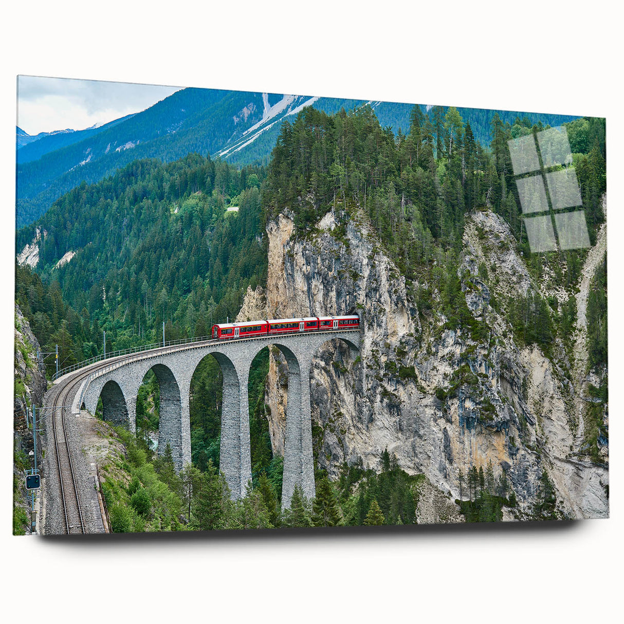 Side view of a large abstract train print on acrylic glass, featuring gray and blue tones.