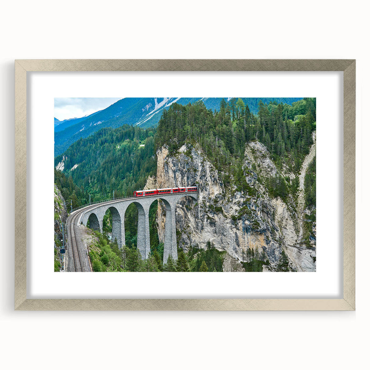 Textured abstract art print of a stylized train in neutral tones on a framed silver mat, ideal for bedroom wall decor.