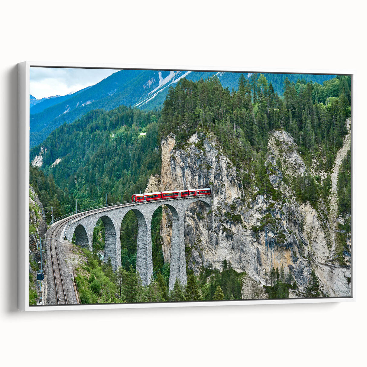 Vintage poster art of a classic train in vibrant colors on a large framed canvas, suited for living room decor.