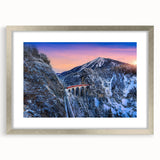 Textured art print of an abstract train, rendered in dark gray tones on a silver-framed canvas, suitable for bedroom decor.