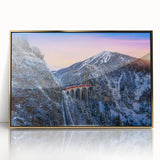 Mid-century modernist train illustration in muted gold and black tones, acrylic print framed in gold.