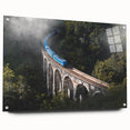 Acrylic print of a side-view train in muted gray and blue tones, suitable for dining room or bedroom decor.