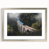 Textured art print of an abstract train in gray and silver tones on a framed canvas, suitable for bedroom decor.