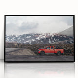 Framed acrylic print of abstract trucks in muted gray and orange, ideal for modern art wall decor.