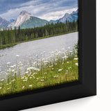 Close-up of a framed canvas wall art piece showcasing a vibrant wildflower design with intricate details and rich colors, perfect for home decor.