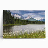 Vibrant wall art design showcasing a collection of wildflowers on a stretched canvas, leaning against a textured wall, perfect for home decor enhancement.