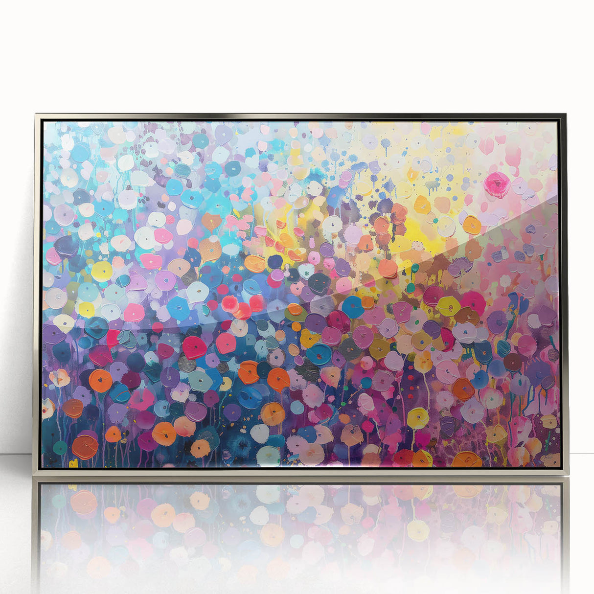 Framed wall art featuring a vibrant wildflower design in a sleek silver frame, showcasing colorful blossoms against a minimalist background, ideal for modern decor.